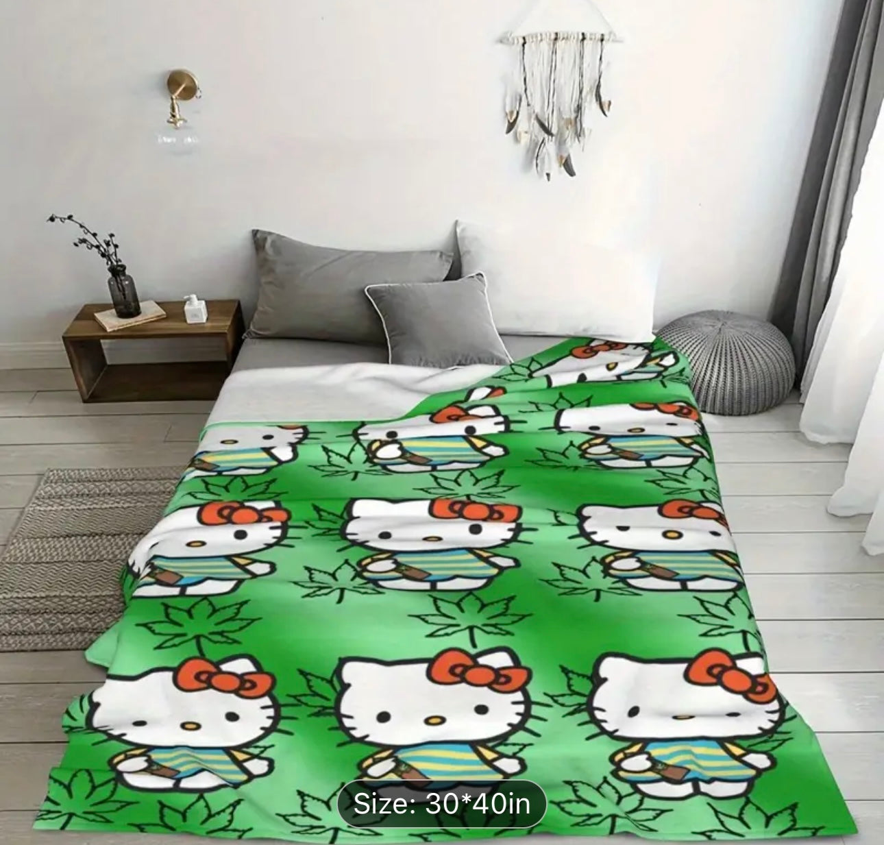 A Hello Kitty cartoon printed blanket